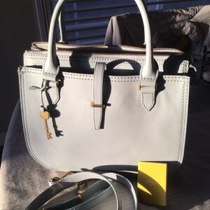 Fossil women’s light blue purse with shoulder strapp